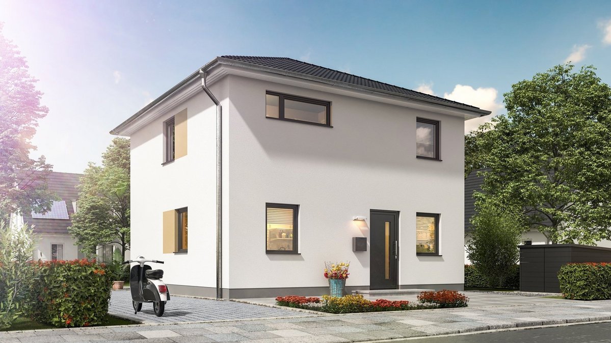 Modernes Einfamilienhaus mit heller Fassade, Walmdach, Eingangsbereich und gepflasterter Zufahrt