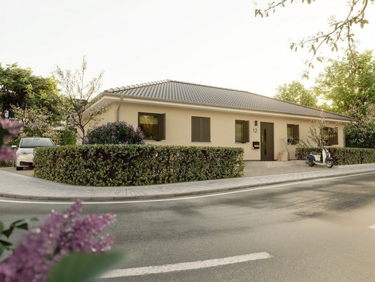 Moderner Bungalow mit Walmdach in ruhiger Wohnstraße – Massivhaus von Thielker im Raum Hörstel.