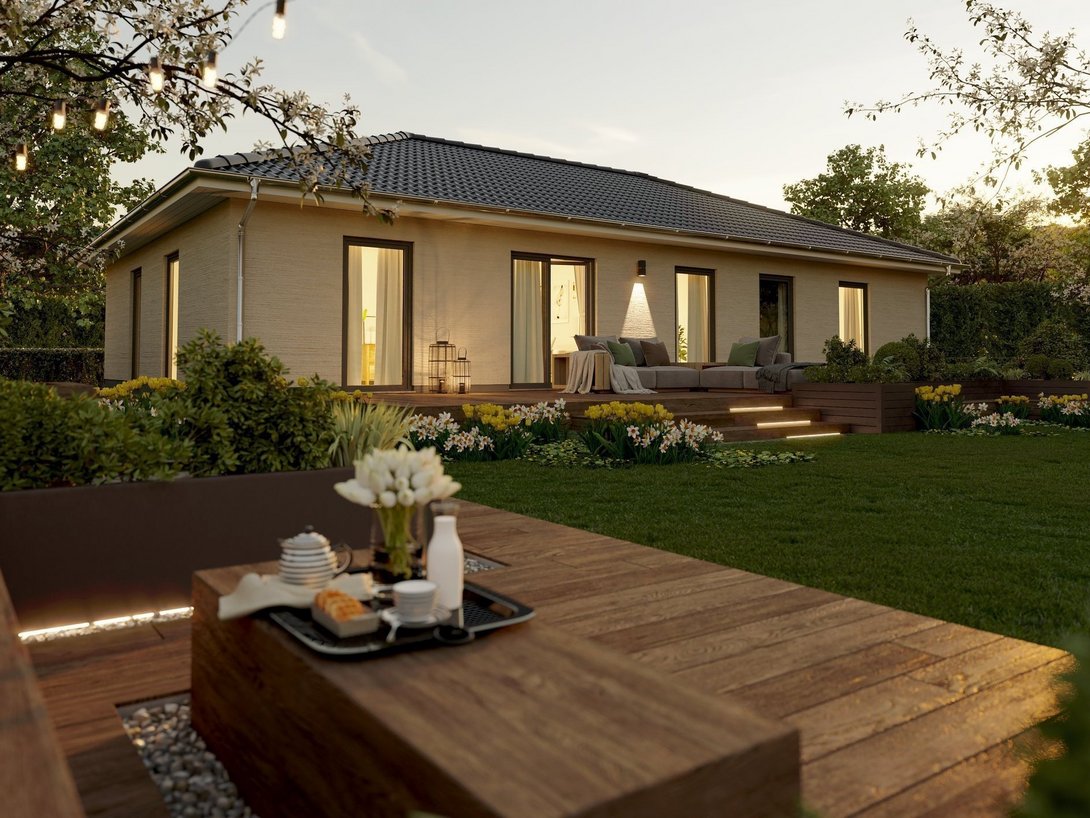 Bungalow bauen im Baugebiet Vennweg Süd Moderner Bungalow mit Terrasse und Garten als Beispiel für ebenerdiges Wohnen im Baugebiet Vennweg Süd in Emsdetten