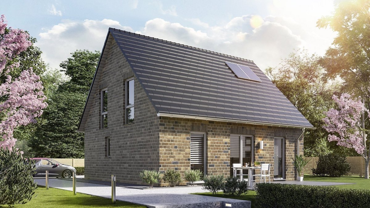 Modernes Klinkerhaus in Massivbauweise mit Satteldach und Solaranlage in Rheine.