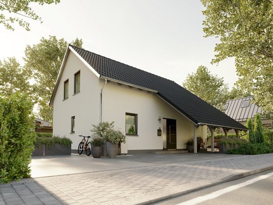 Modernes Einfamilienhaus mit schwarzem Satteldach, Carport und gepflasterter Einfahrt an einer ruhigen Straße.