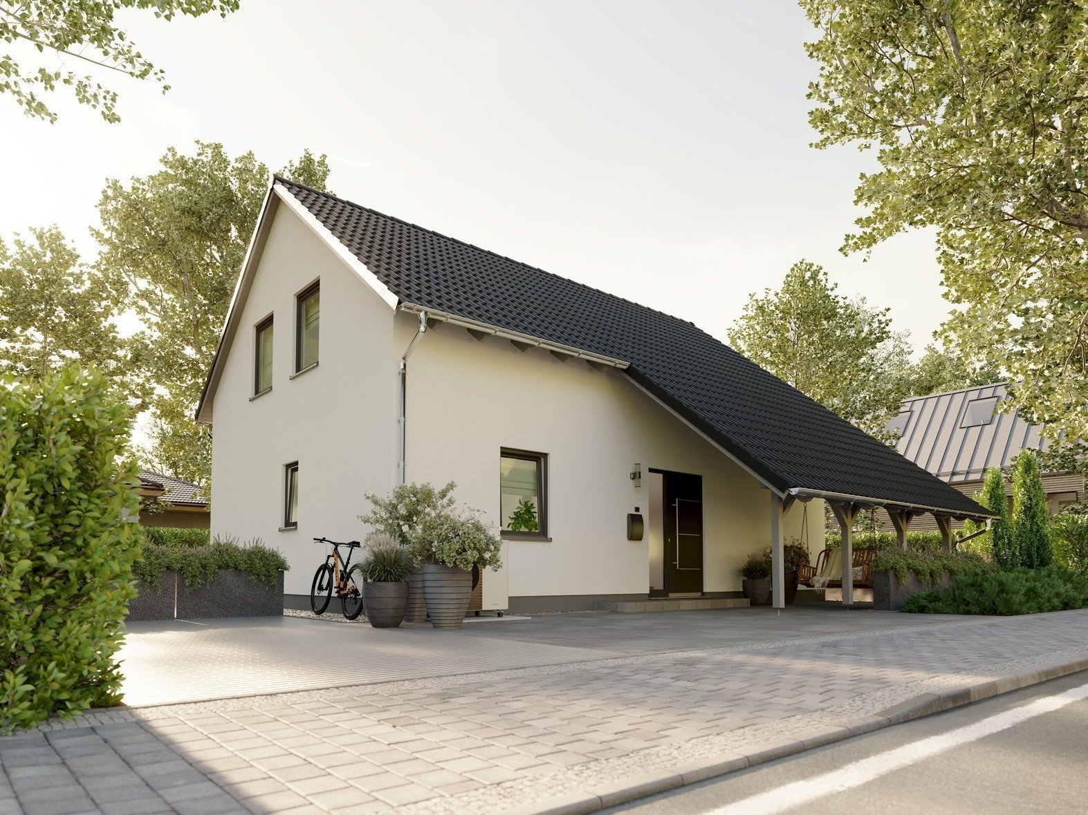 Modernes Einfamilienhaus mit schwarzem Satteldach, Carport und gepflasterter Einfahrt an einer ruhigen Straße.