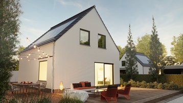 Einfamilienhaus mit Terrasse im Landkreis Emsland bauen mit Thielker MassivHaus Modernes Einfamilienhaus mit Satteldach, Photovoltaikanlage, großer Holzterrasse und Garten im Landkreis Emsland