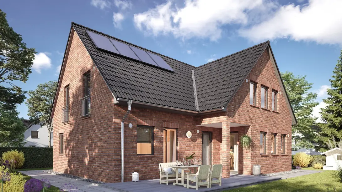 Klinkerhaus mit Satteldach und Photovoltaik Modernes Einfamilienhaus aus rotem Klinker mit Satteldach und Solaranlage – klassisches Massivhaus im Münsterland.