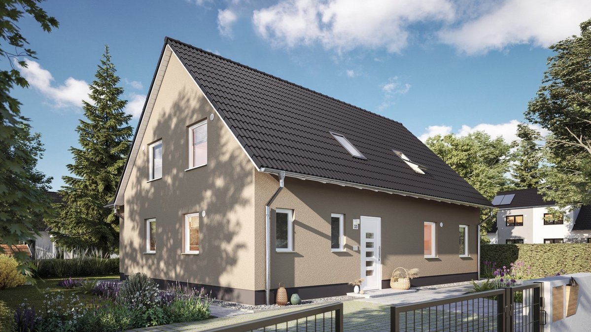 Modernes Einfamilienhaus mit roter Klinkerfassade, dunklem Satteldach, Dachfenstern und gepflegtem Vorgarten