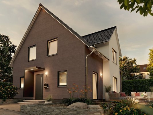 Einfamilienhaus mit dunklem Klinker und Satteldach – Thielker MassivHaus Modernes Einfamilienhaus mit Satteldach und dunkler Klinkerfassade – Massivhaus von Thielker MassivHaus