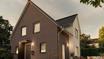 Modernes Einfamilienhaus mit Terrasse bei Abendlicht Modernes Einfamilienhaus mit Satteldach, zweifarbiger Fassade, Terrasse und stimmungsvoller Abendbeleuchtung