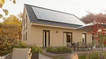 Einfamilienhaus mit Photovoltaik im Landkreis Emsland bauen mit Thielker MassivHaus Einfamilienhaus mit großer Photovoltaikanlage, Terrasse und Garten im Landkreis Emsland