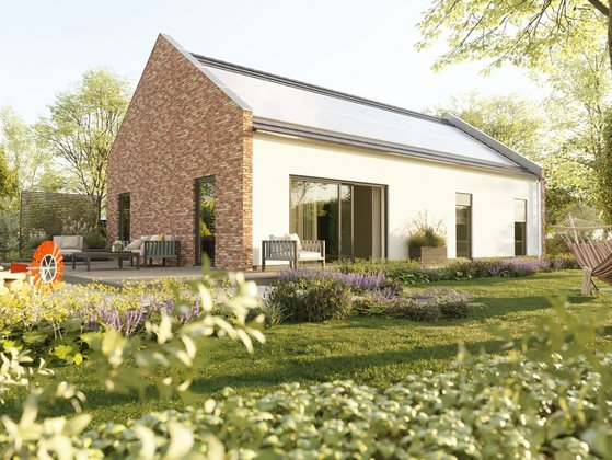 Modernes Einfamilienhaus mit Satteldach und Klinkerfassade in ruhiger Gartenlage