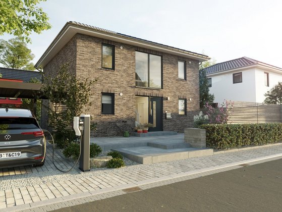 Modernes zweigeschossiges Stadthaus mit Klinkerfassade, großen Fenstern und Carport