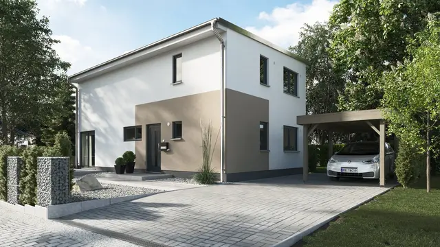 Modernes Einfamilienhaus von Thielker Massivhaus in Neuenkirchen Modernes Massivhaus mit Flachdach und Carport in ruhiger Wohnlage – Einfamilienhaus von Thielker Massivhaus in Neuenkirchen.
