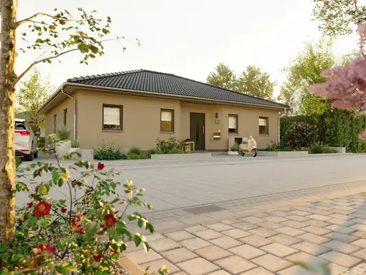 Bungalow in Rheine massiv gebaut Moderner Bungalow in Massivbauweise mit Walmdach und gepflasterter Einfahrt in ruhiger Wohnlage in Rheine.