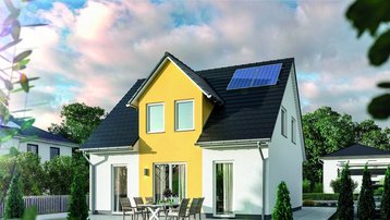 Einfamilienhaus mit Photovoltaik im Landkreis Emsland bauen mit Thielker MassivHaus Einfamilienhaus mit gelber Akzentfassade, Photovoltaikanlage, Terrasse und Garten im Landkreis Emsland