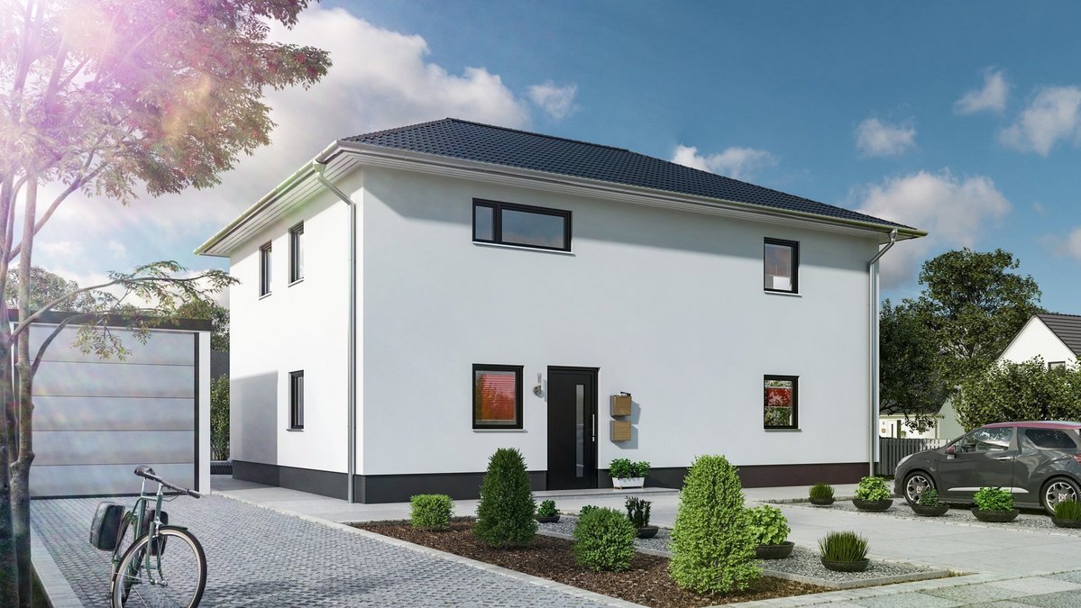 Modernes Einfamilienhaus mit heller Fassade, Walmdach, Garage, Vorgarten und gepflasterter Zufahrt