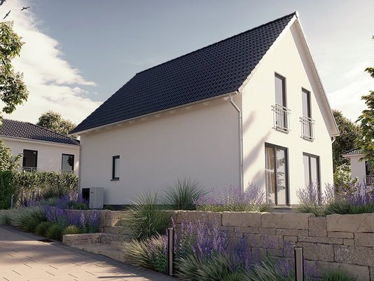 Modernes Einfamilienhaus mit weißer Putzfassade und Satteldach – individuell geplantes Massivhaus von Thielker MassivHaus