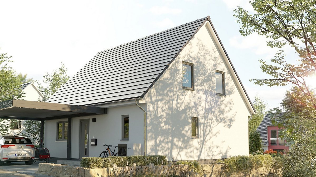 Modernes Einfamilienhaus mit heller Fassade, Satteldach, Carport und Natursteinmauer im Landkreis Emsland