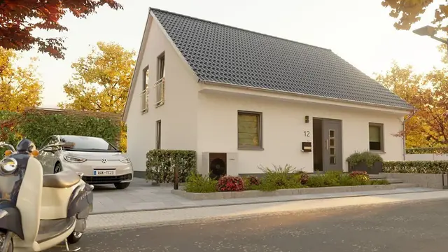 Modernes Einfamilienhaus in Massivbauweise Modernes Einfamilienhaus mit heller Putzfassade und Satteldach – energieeffizientes Massivhaus von Thielker MassivHaus