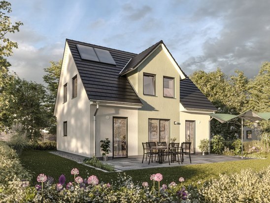 Modernes Einfamilienhaus von Thielker MassivHaus mit Satteldach, Solaranlage, Terrasse und Garten im Münsterland.