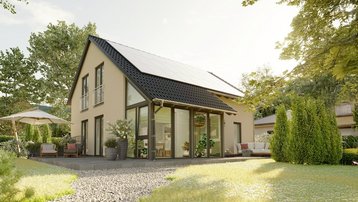 Einfamilienhaus mit Photovoltaik im Landkreis Emsland bauen mit Thielker MassivHaus Modernes Einfamilienhaus mit Photovoltaikanlage, Glasfront, Terrasse und großem Garten im Landkreis Emsland