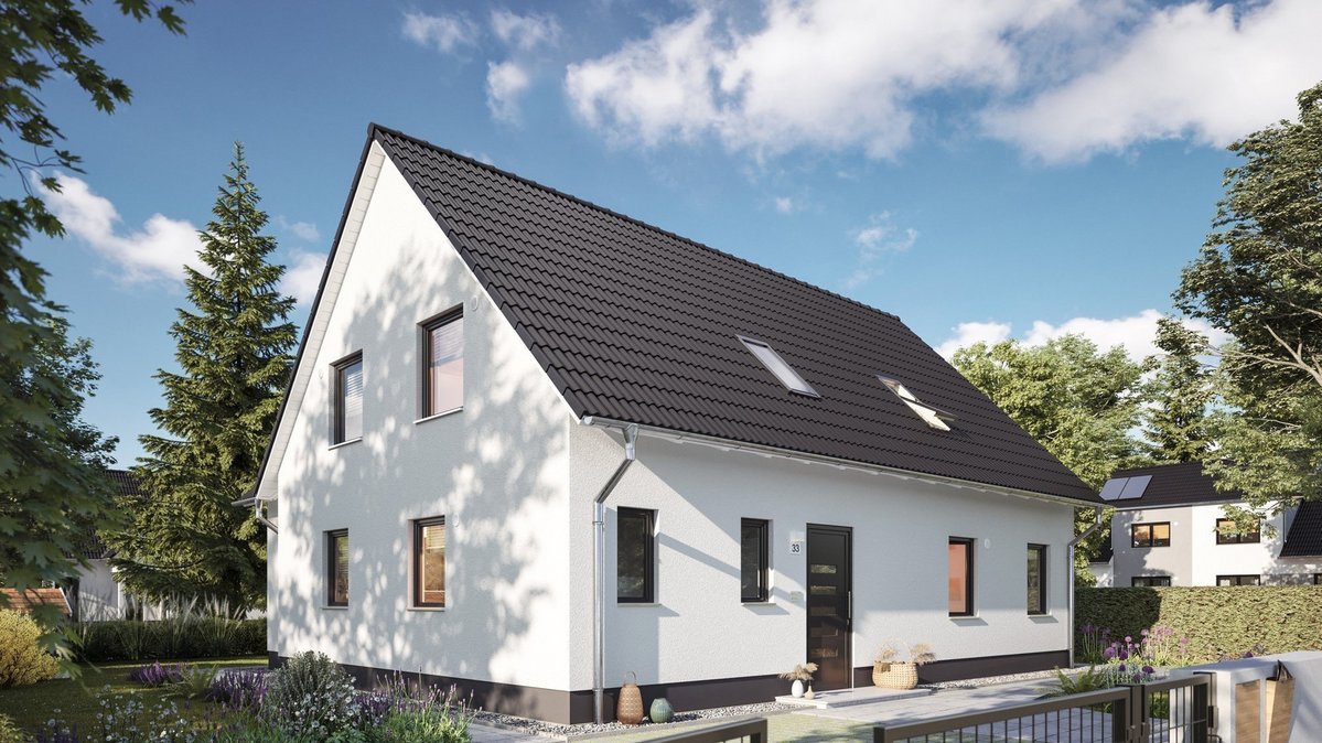 Modernes Einfamilienhaus mit heller Fassade, Satteldach, Dachfenstern und Vorgarten im Landkreis Emsland