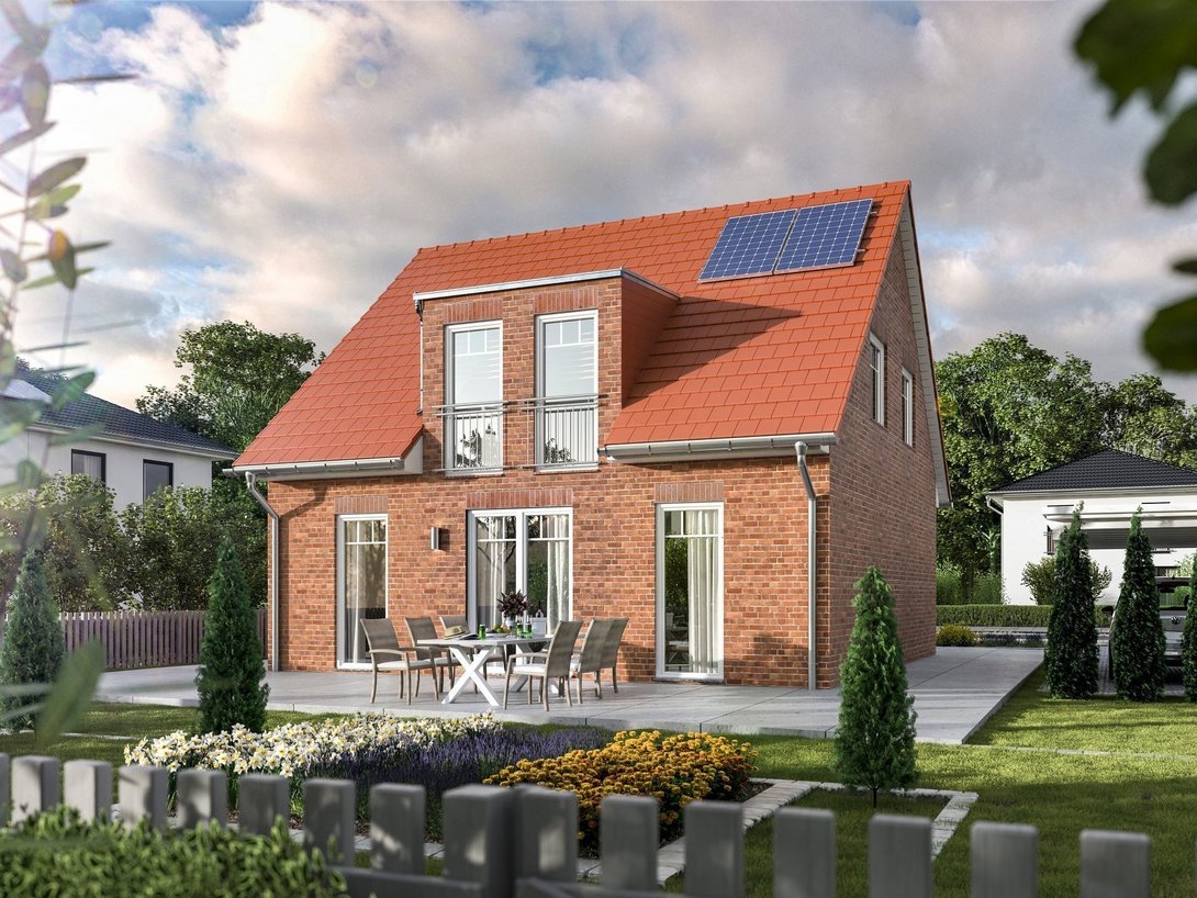 Einfamilienhaus bauen im Baugebiet Vietsesch Modernes Einfamilienhaus mit roter Klinkerfassade, Satteldach, Solaranlage und Garten als Beispiel für Hausbau im Baugebiet Vietsesch in Metelen