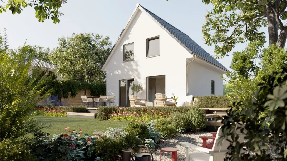 Einfamilienhaus im Grünen in Greven Reckenfeld Modernes Einfamilienhaus mit hellem Putz, Satteldach und Garten als Beispiel für Hausbau in Greven Reckenfeld