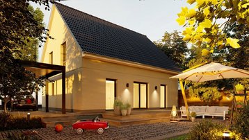 Modernes Einfamilienhaus mit Satteldach, Terrasse, Garten und stimmungsvoller Außenbeleuchtung