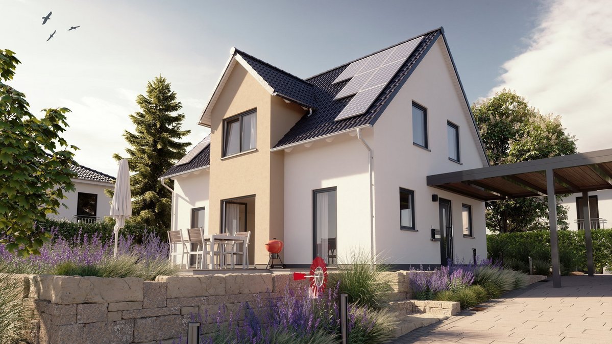 Modernes Einfamilienhaus mit Solaranlage, Terrasse und Carport – energieeffizientes Massivhaus von Thielker MassivHaus