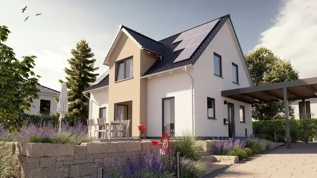 Modernes Einfamilienhaus mit Solaranlage Modernes Einfamilienhaus mit Solaranlage, Terrasse und Carport – energieeffizientes Massivhaus von Thielker MassivHaus